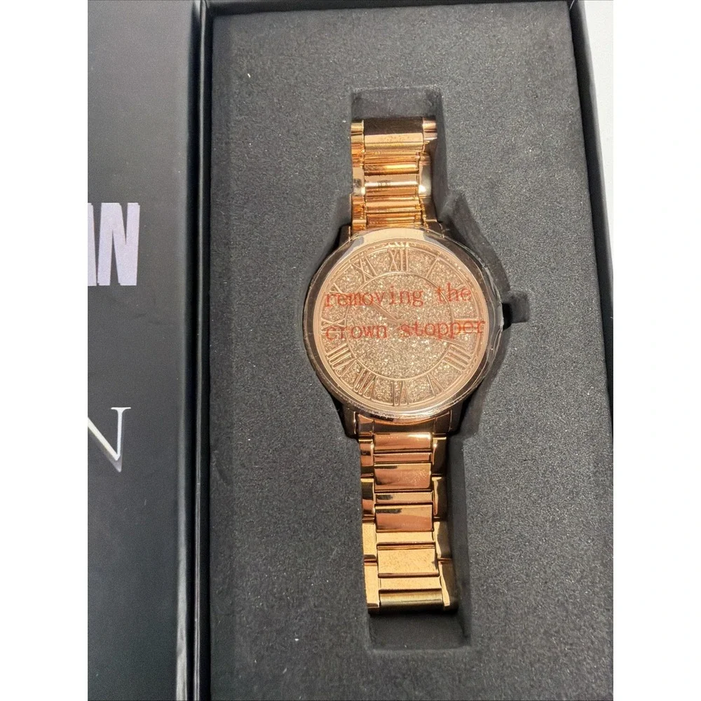 Croton Manhattan watch features‎ a gold-tone design